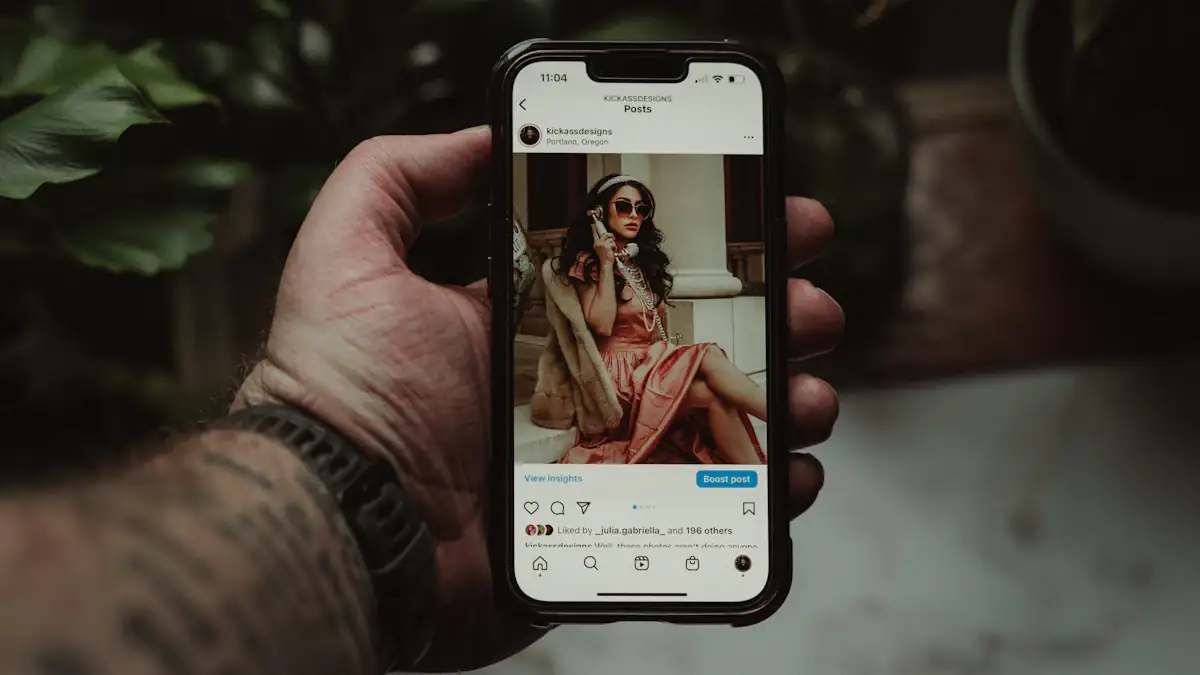 Instagram profile page open on a phone held in one hand
